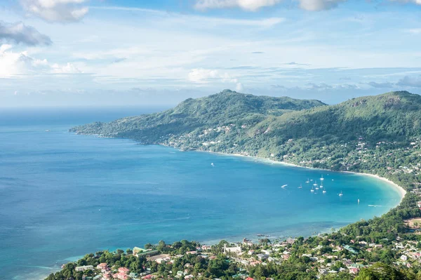Seychelles Islands with Ocean Water and Blue Sky with Clouds. Landscape.