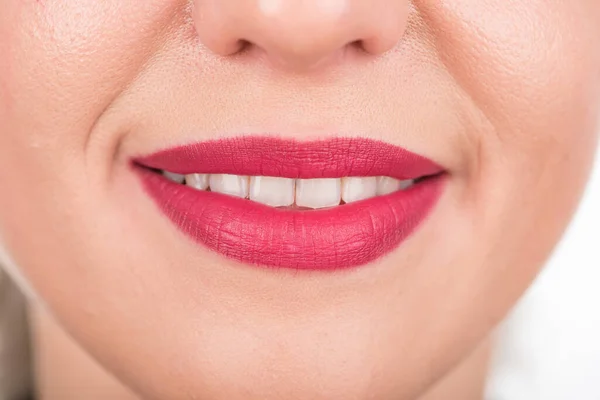 Curious Woman Face With Pretty Smile and White Teeth. Studio Photo Shoot. Use Bright Red Lipstick.