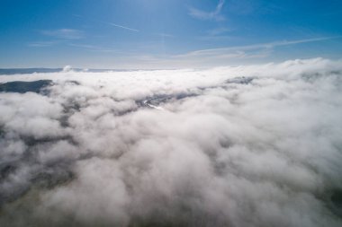 Landscape and Nature above the cloud in the California. Mountain in Background.