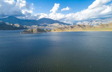Isabella Lake in California. Beautiful Cloudy Sky and Mountain in Background. Bright Sunny Day
