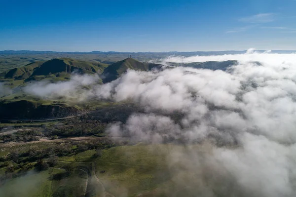 Landscape and Nature above the cloud in the California. Mountain in Background.