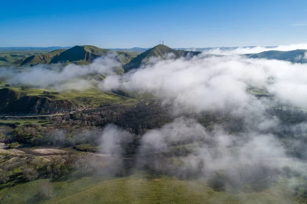 Landscape and Nature above the cloud in the California. Mountain in Background.