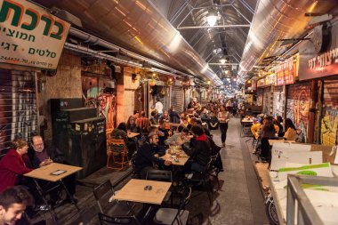 Jerusalem, Israel - December 06, 2018: Famous Market in Jerusalem for Celebrating. Local Restaurant and People.