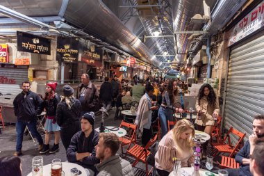 Jerusalem, Israel - December 06, 2018: Famous Market in Jerusalem for Celebrating. Local Restaurant and People.