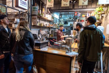 Jerusalem, Israel - December 06, 2018: Famous Market in Jerusalem for Celebrating. Local Restaurant and People.