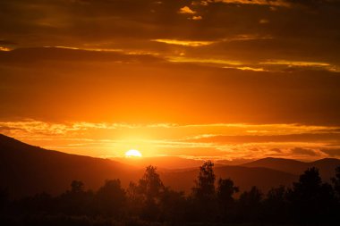 Beautiful Sunset in Croatia. Sunlight and Mountains in Background. Beautiful Sky
