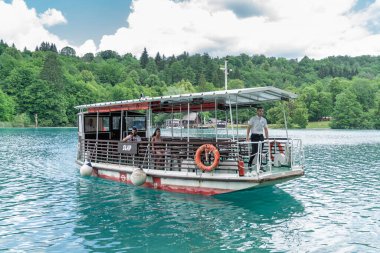 River boat at Plitvice Lakes National Park, Croatia. Transfering Tourists