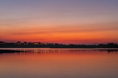 Beautiful Sunset in Croatia. Sunlight on the shore of Sea. Beautiful colors. Reflection