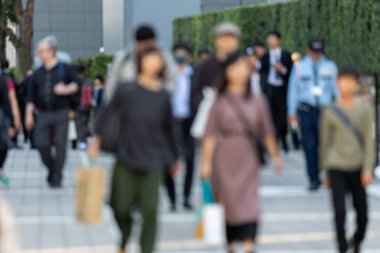 Blurry Business People in Tokyo, Japan. Shinjuku Area. Bright Sunny Day