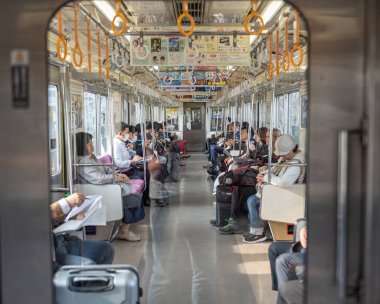 Train Interior and People are traveling to Narita International Airport, Tokyo, Japan.