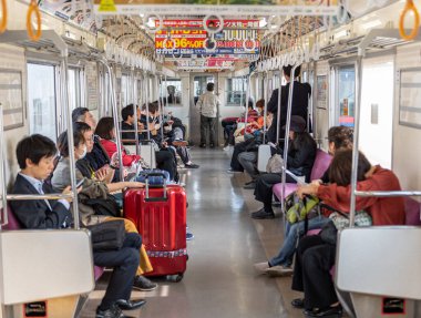 Train Interior and People are traveling to Narita International Airport, Tokyo, Japan.