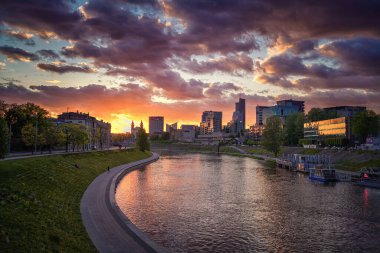 Vilnius Old Town with Beautiful Sunset Light. Cloudy Sky. River Neris in Background. Vilnius is Capital of Lithuania. Spring Time
