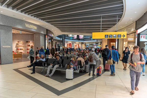 Stock image ROME, ITALY - OCTOBER 23, 2019: Rome international Leonardo da Vinci Fiumicino Airport interior with people. Departure area with Duty Free shops.