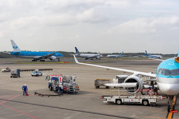 stock image NARITA, JAPAN - OCTOBER 31, 2019: Narita International Airport with Runway and Airplanes in Background.