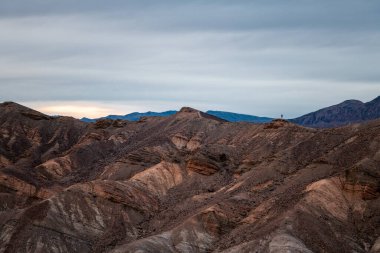 Zabriskie Point. It is a part of the Amargosa Range located east of Death Valley in Death Valley National Park in California, United States.