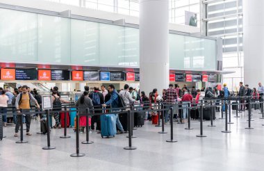 SAN FRANCISCO, CALIFORNIA - APRIL 04, 2019: San Francisco International Airport Check-in area. Emirates Airlines desks.
