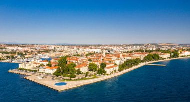 Aerial shot of Zadar old town, famous tourist attraction in Croatia. Waterfront aerial summer view, Dalmatia region of Croatia. Drone.
