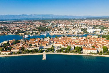 Aerial shot of Zadar old town, famous tourist attraction in Croatia. Waterfront aerial summer view, Dalmatia region of Croatia. Drone.