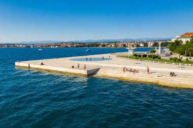 Aerial shot of Zadar old town, famous tourist attraction in Croatia. Waterfront aerial summer view, Dalmatia region of Croatia. Drone.