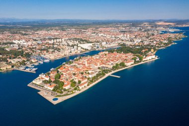 Aerial shot of Zadar old town, famous tourist attraction in Croatia. Waterfront aerial summer view, Dalmatia region of Croatia. Drone.