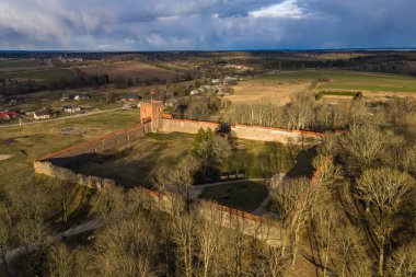 Medininkai Castle in Lithuania. medieval castle in Vilnius district, Lithuania, was built in the first half of the 14th century. The castle had 4 gates and towers.