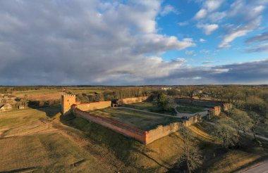 Medininkai Castle in Lithuania. medieval castle in Vilnius district, Lithuania, was built in the first half of the 14th century. The castle had 4 gates and towers.
