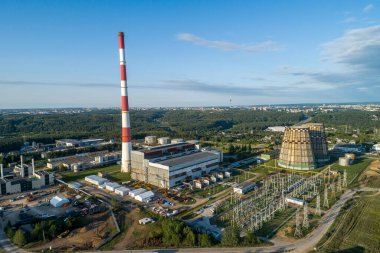 Cogeneration Power Plant Construction Area in Vilnius, Lithuania. Close to Gariunai Market. Forest in Background clipart