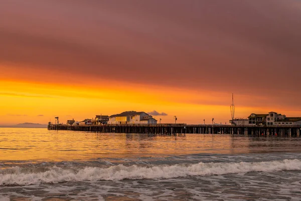 Santa Barbara Pier and shoreline, California. Sunrise Skyline and Pier in Background.
