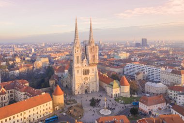 Zagreb Old Town And Cathedral in Background. Sightseeing Place in Croatia. Beautiful Sunset Light. Tourist Visiting Famous Place