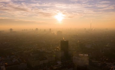 Hazy, Foggy and Misty Zagreb Cityscape, Croatia. Sunset Light in Background