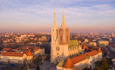 Zagreb Old Town And Cathedral in Background. Sightseeing Place in Croatia. Beautiful Sunset Light. Tourist Visiting Famous Place