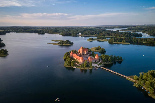 stock image Trakai Castle with lake and forest in background. One of the most famous Sightseeing place in Lithuania