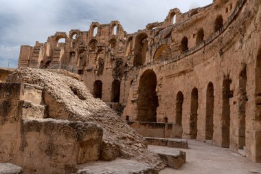 Amphitheatre of El Jem in Tunisia. Amphitheatre is in the modern-day city of El Djem, Tunisia, formerly Thysdrus in the Roman province of Africa. It is listed by UNESCO since 1979 as a World Heritage Site
