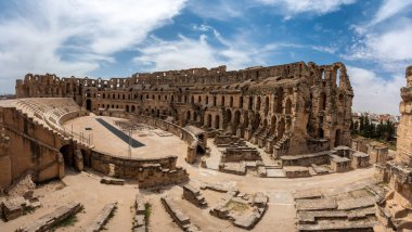 Tunus 'ta El Jem Amfitiyatrosu. Amfiteatr, Tunus 'un El Cem şehrinde, eski adı Thysdrus olan Roma' nın Afrika eyaletinde yer almaktadır. 1979 yılından bu yana UNESCO tarafından Dünya Mirası Listesi olarak listelenmektedir.