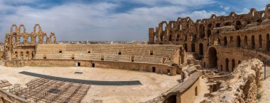 Amphitheatre of El Jem in Tunisia. Amphitheatre is in the modern-day city of El Djem, Tunisia, formerly Thysdrus in the Roman province of Africa. It is listed by UNESCO since 1979 as a World Heritage Site