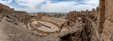 Amphitheatre of El Jem in Tunisia. Amphitheatre is in the modern-day city of El Djem, Tunisia, formerly Thysdrus in the Roman province of Africa. It is listed by UNESCO since 1979 as a World Heritage Site