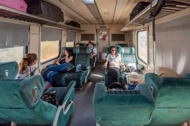 EL JEM, TUNISIA - JUNE 17, 2019: Train interior in Tunisian Railway Network. 1st Class Carriage with people traveling to Tunis.