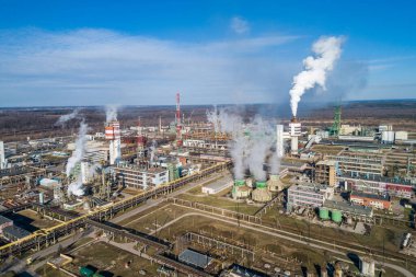 Chemistry Factory in Lithuania, Achema in Jonava City. Clear Blue Sky and Smoke in background.