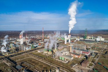 Chemistry Factory in Lithuania, Achema in Jonava City. Clear Blue Sky and Smoke in background.
