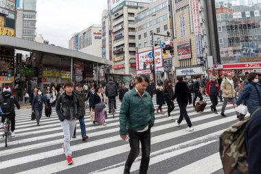 Tokyo Cityscape. People walks on Crossing. Shinjuku area. Japan