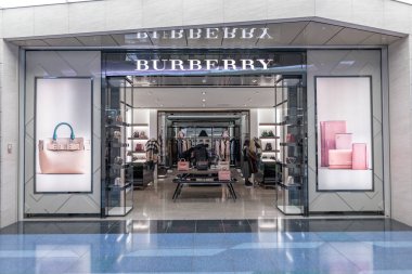 Tokyo International Haneda Airport. Departure Area with Duty Free Shop. Burberry clipart
