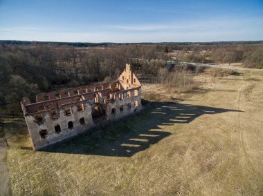 Paulavos Republic in Lithuania. Old Bricks Ruins with Forest in Background. Sightseeing object in Lithuania.