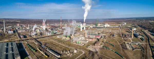 Chemistry Factory in Lithuania, Achema in Jonava City. Clear Blue Sky and Smoke in background.
