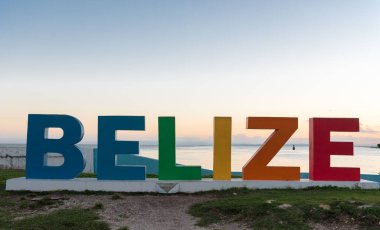 Colorful Belize name with Caribbean Sea in Background. Caribbean Island