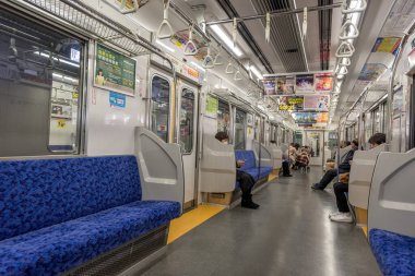 Tokyo Metro with People. Interior.