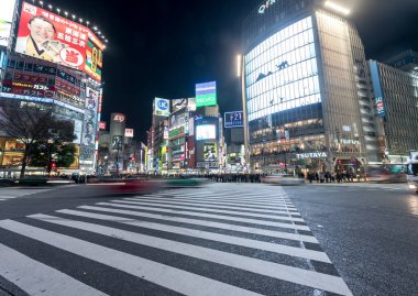 Shibuya District in Tokyo. Famous and busiest intersection in the world, Japan. Shibuya Crossing. Blurry Panning Car