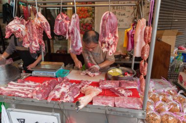 Taipei Street in one of suburb, district. Market Street in Taipei. Selling Meat
