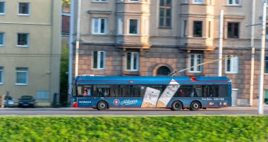 Vilnius City Public Transport Old Trolley and Traffic. Blurry Background Because of Panning Effect