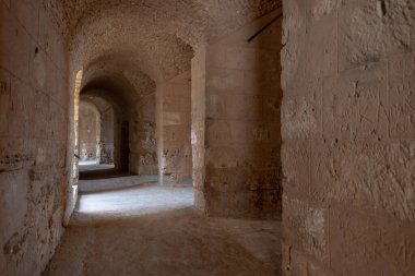 Interior of Amphitheatre of El Jem in Tunisia. Amphitheatre is in the modern-day city of El Djem, Tunisia, formerly Thysdrus in the Roman province of Africa. It is listed by UNESCO since 1979 as a World Heritage Site