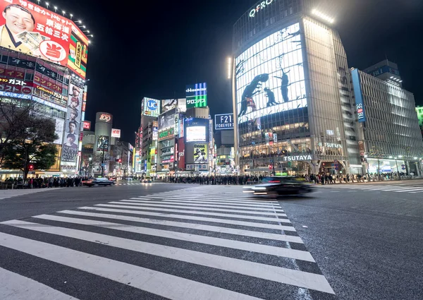 Shibuya District in Tokyo. Famous and busiest intersection in the world, Japan. Shibuya Crossing. Blurry Panning Car